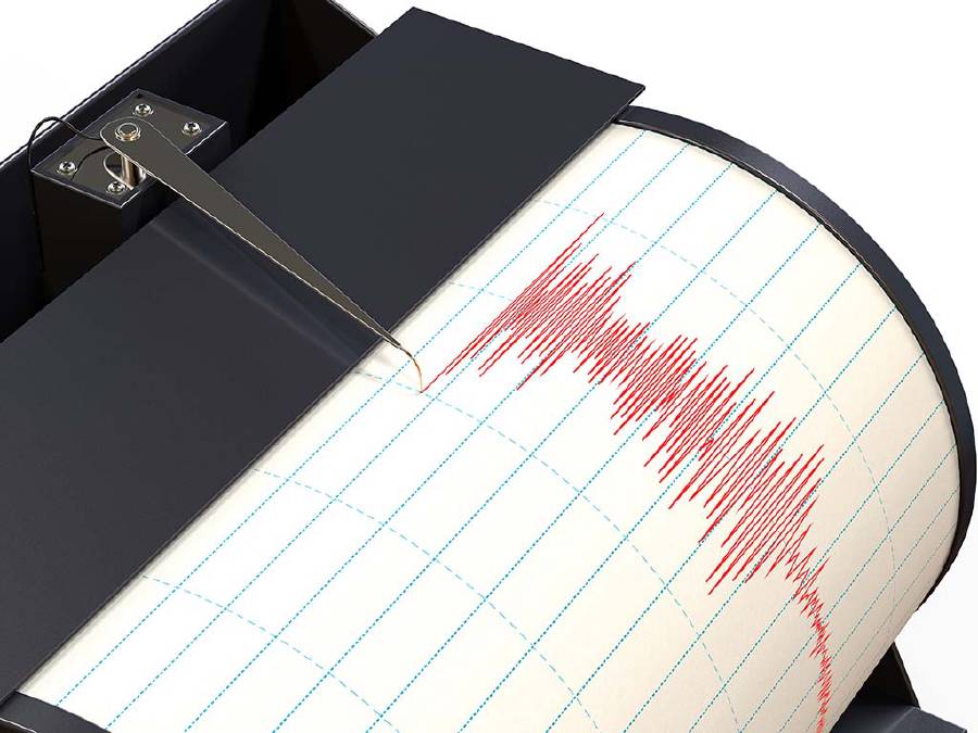 Seismograph instrument recording ground motion during earthquake